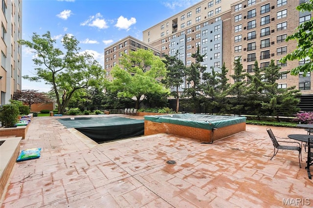 900 S Hanley Rd Unit 7B, Saint Louis, MO 63105 - view of pool with a covered hot tub and a patio area