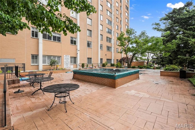 900 S Hanley Rd Unit 7B, Saint Louis, MO 63105 - view of swimming pool with a patio area