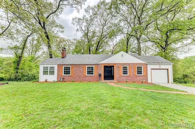 14 Carson Dr, Belleville, IL 62223 - single story home with a garage, a chimney, brick siding, and driveway