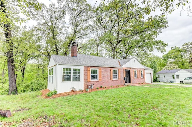 14 Carson Dr, Belleville, IL 62223 - single story home featuring a chimney, a garage, a front lawn, and brick siding