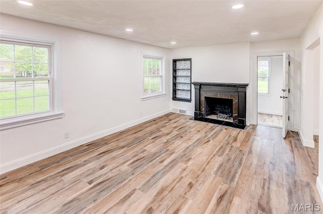 14 Carson Dr, Belleville, IL 62223 - unfurnished living room featuring light wood-style flooring, recessed lighting, baseboards, and a fireplace