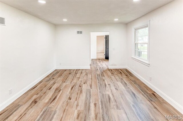14 Carson Dr, Belleville, IL 62223 - empty room featuring recessed lighting, light wood-style floors, and baseboards
