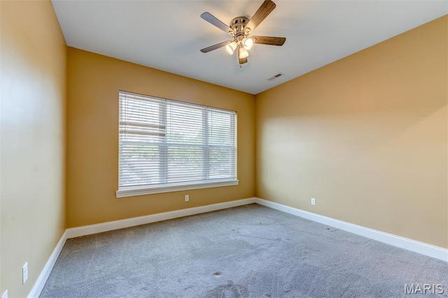 3327 Park Ave, Saint Louis, MO 63104 - carpeted empty room featuring a ceiling fan, baseboards, and lofted ceiling