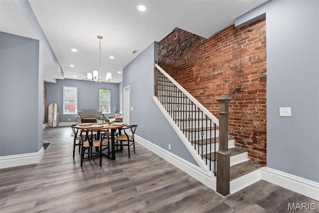 3244 Michigan Ave, Saint Louis, MO 63118 - dining room featuring stairs, wood finished floors, baseboards, recessed lighting, and a chandelier