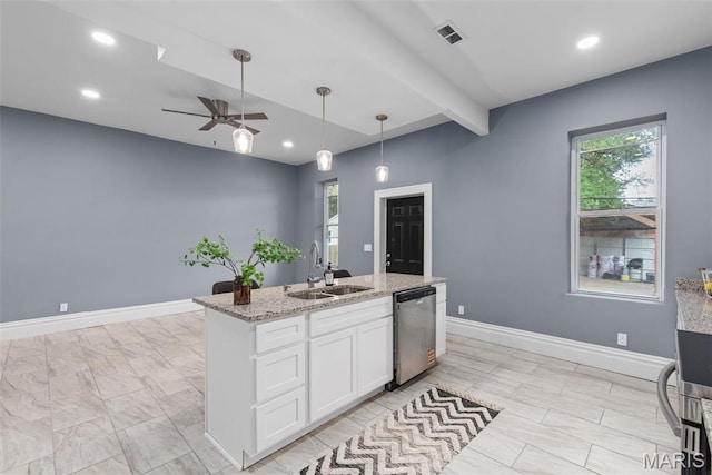 3244 Michigan Ave, Saint Louis, MO 63118 - kitchen featuring a sink, stainless steel dishwasher, white cabinetry, ceiling fan, and light stone counters