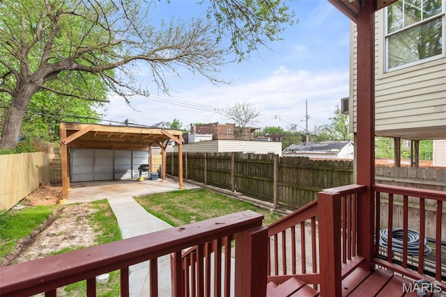3244 Michigan Ave, Saint Louis, MO 63118 - wooden deck featuring a fenced backyard and an outbuilding