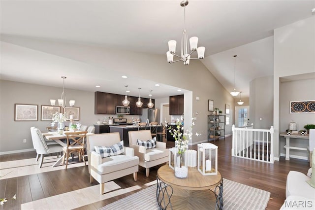4609 Siesta Dr, Imperial, MO 63052 - living area featuring a chandelier, wood finished floors, high vaulted ceiling, and recessed lighting