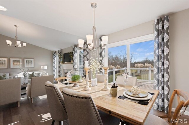 4609 Siesta Dr, Imperial, MO 63052 - dining room featuring a chandelier, dark wood finished floors, and lofted ceiling