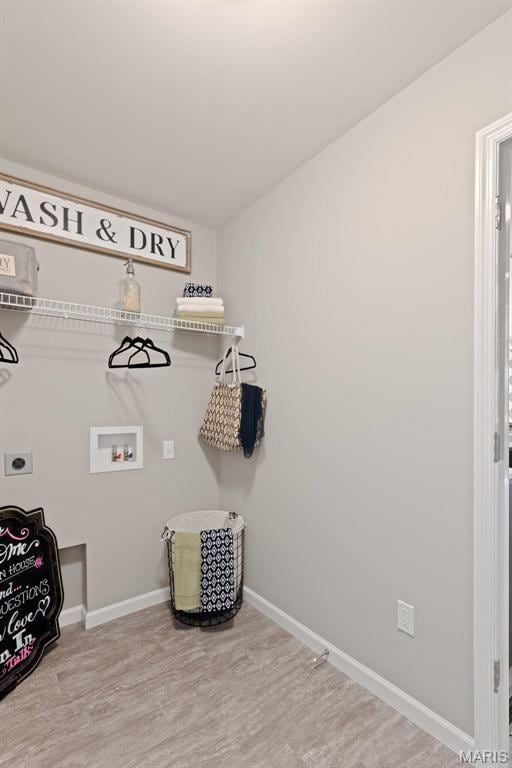 4609 Siesta Dr, Imperial, MO 63052 - laundry room with washer hookup, wood finished floors, and electric dryer hookup