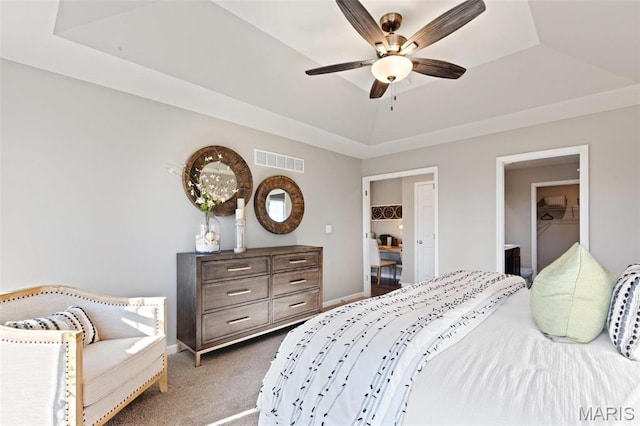 4609 Siesta Dr, Imperial, MO 63052 - bedroom featuring a tray ceiling, carpet flooring, and ceiling fan