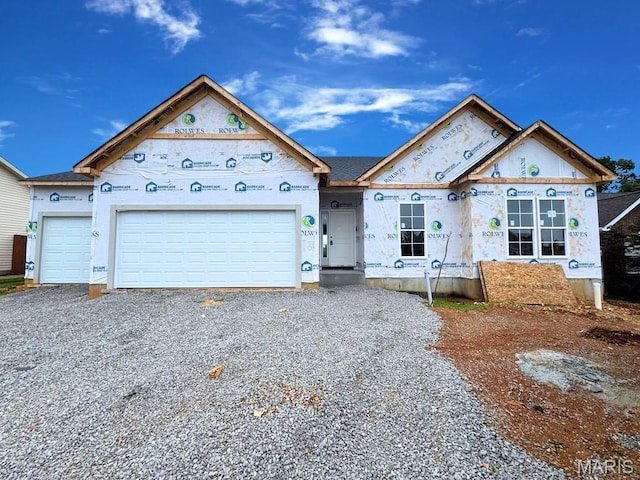 4609 Siesta Dr, Imperial, MO 63052 - unfinished property with gravel driveway and a garage