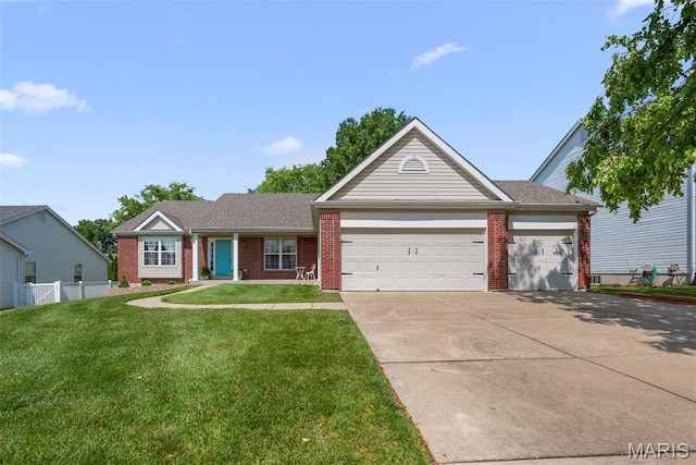 2222 Harborside Dr, Ofallon, MO 63368 - ranch-style house featuring brick siding, an attached garage, and driveway