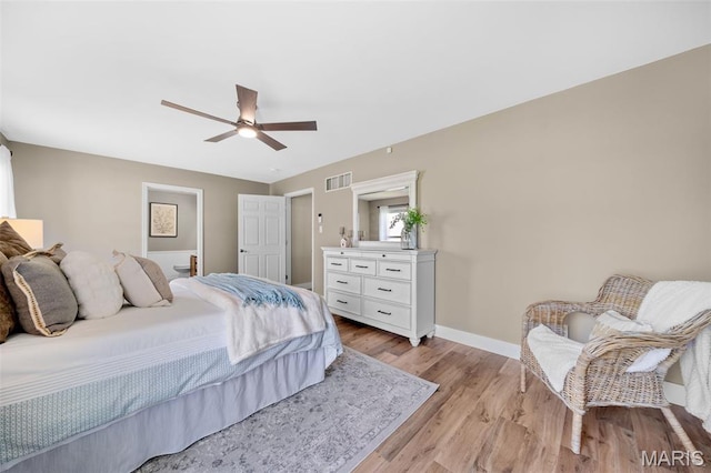 2222 Harborside Dr, Ofallon, MO 63368 - bedroom with light wood-type flooring, baseboards, and ceiling fan