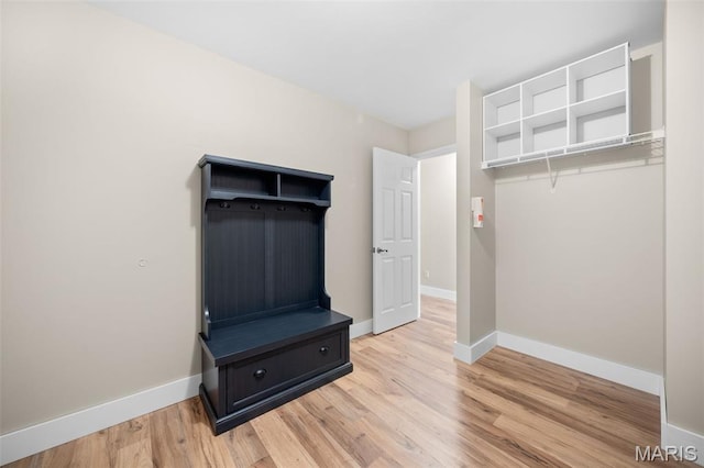 2222 Harborside Dr, Ofallon, MO 63368 - unfurnished bedroom featuring baseboards and light wood-style floors