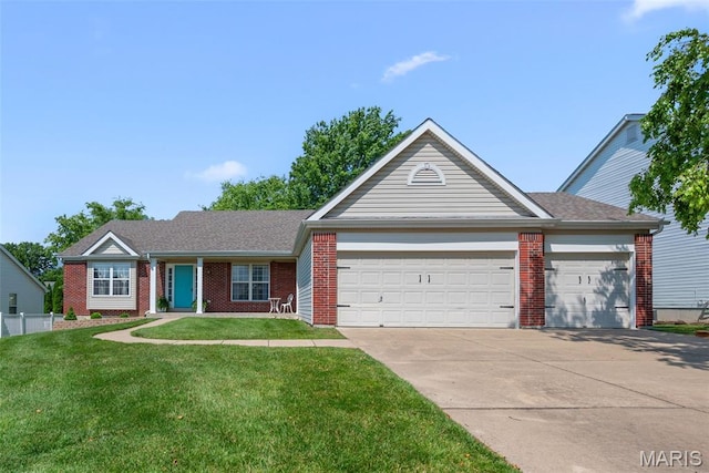 2222 Harborside Dr, Ofallon, MO 63368 - ranch-style house featuring an attached garage, concrete driveway, a front lawn, and brick siding