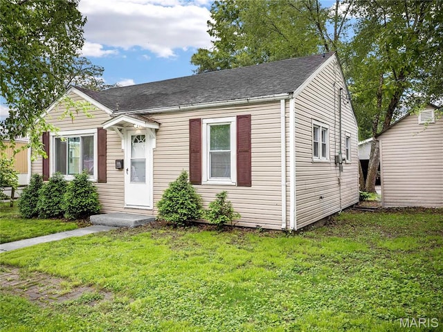 123 E Charter St, Troy, IL 62294 - bungalow-style home featuring a front yard