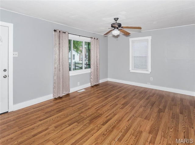 123 E Charter St, Troy, IL 62294 - spare room with wood finished floors, ceiling fan, baseboards, and crown molding