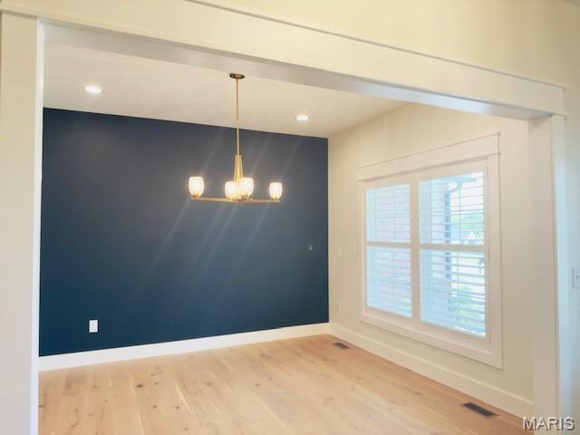 242 Orange Bowl Dr, Cape Girardeau, MO 63701 - unfurnished dining area featuring baseboards, a chandelier, light wood-style floors, and recessed lighting