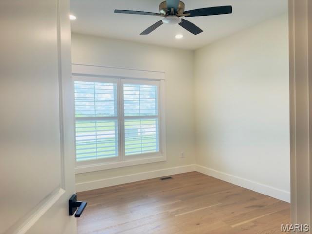 242 Orange Bowl Dr, Cape Girardeau, MO 63701 - unfurnished room featuring baseboards, light wood finished floors, a ceiling fan, and recessed lighting
