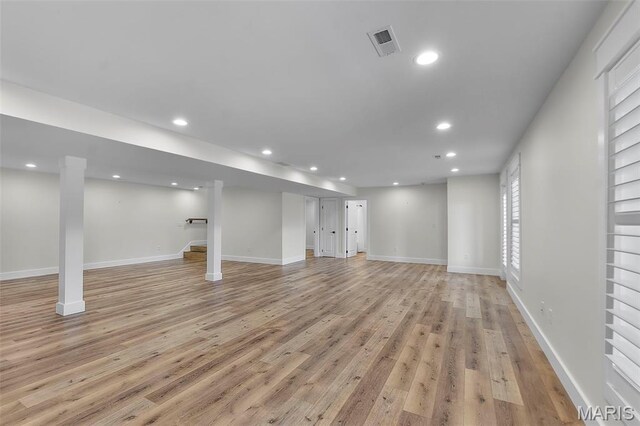 242 Orange Bowl Dr, Cape Girardeau, MO 63701 - below grade area with light wood-style floors, recessed lighting, and baseboards