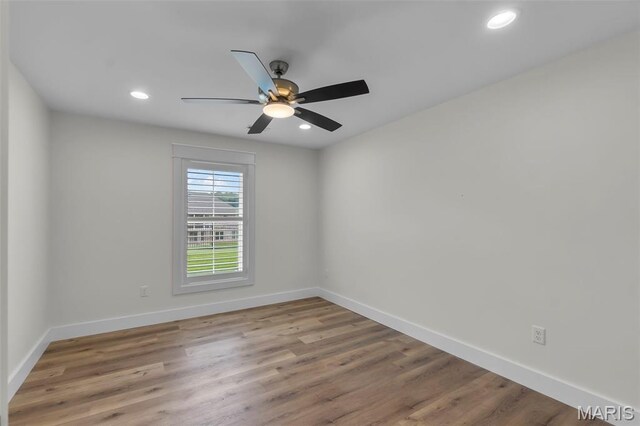 242 Orange Bowl Dr, Cape Girardeau, MO 63701 - empty room with baseboards, a ceiling fan, recessed lighting, and wood finished floors