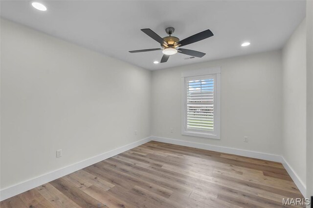 242 Orange Bowl Dr, Cape Girardeau, MO 63701 - empty room with a ceiling fan, baseboards, recessed lighting, and wood finished floors