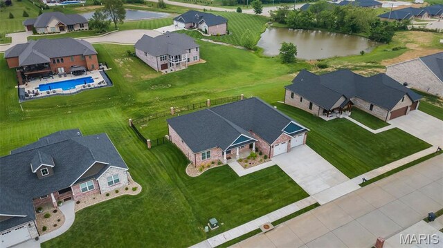 242 Orange Bowl Dr, Cape Girardeau, MO 63701 - aerial view of residential area with a large body of water and a pool area