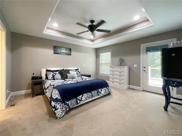 9794 Cedar Dr, Hillsboro, MO 63050 - bedroom featuring a raised ceiling, light colored carpet, access to exterior, baseboards, and a ceiling fan