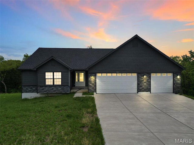 764 Red Clover Dr, Cedar Hill, MO 63016 - view of front of property with driveway, an attached garage, a front lawn, and stone siding