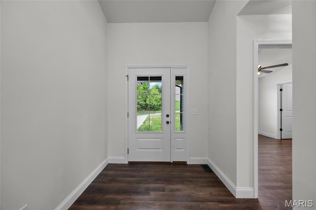 764 Red Clover Dr, Cedar Hill, MO 63016 - doorway to outside featuring dark wood-style floors and baseboards