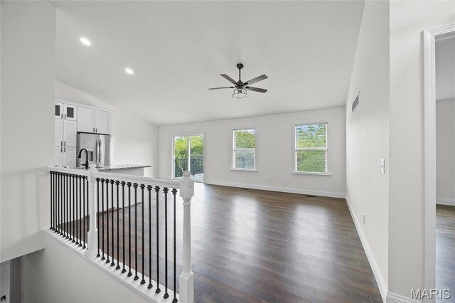 764 Red Clover Dr, Cedar Hill, MO 63016 - unfurnished living room with healthy amount of natural light, ceiling fan, dark wood-style floors, recessed lighting, and baseboards