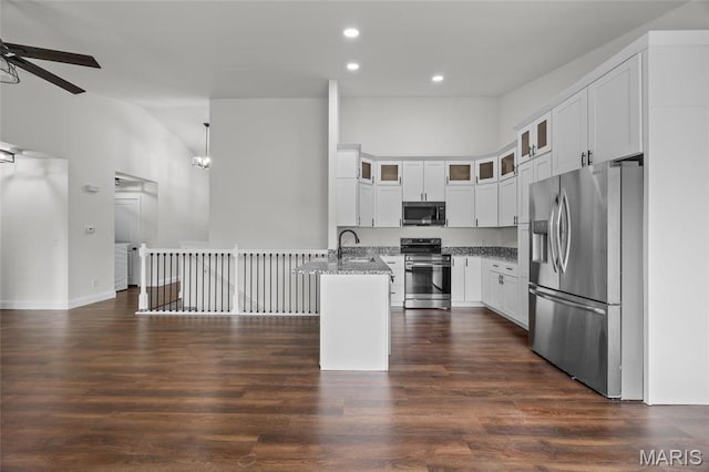 764 Red Clover Dr, Cedar Hill, MO 63016 - kitchen featuring stainless steel appliances, a peninsula, ceiling fan, recessed lighting, and white cabinetry