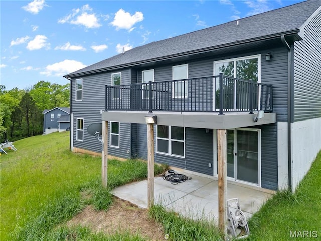 764 Red Clover Dr, Cedar Hill, MO 63016 - rear view of property with a balcony, a patio, a yard, and roof with shingles