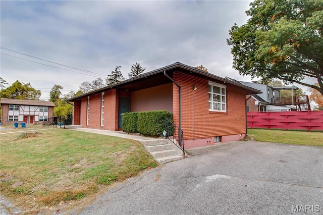view of home's exterior featuring brick siding