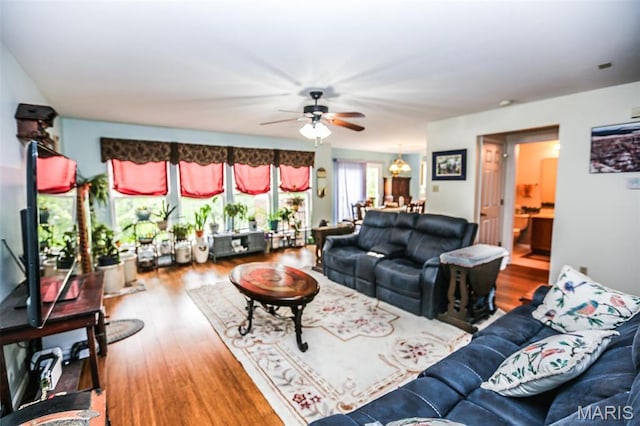 6144 Misty Meadow Dr, House Springs, MO 63051 - living area featuring a ceiling fan and wood finished floors