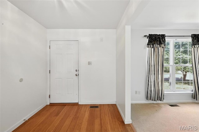 6144 Misty Meadow Dr, House Springs, MO 63051 - foyer entrance with baseboards and wood finished floors