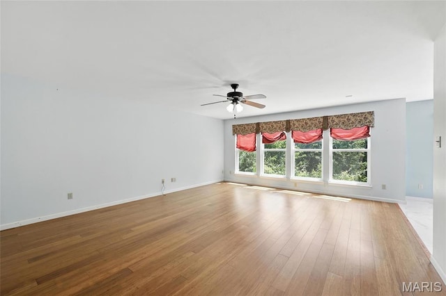 6144 Misty Meadow Dr, House Springs, MO 63051 - empty room featuring hardwood / wood-style floors and a ceiling fan
