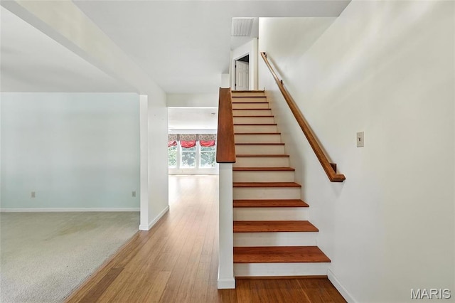 6144 Misty Meadow Dr, House Springs, MO 63051 - stairs featuring wood finished floors