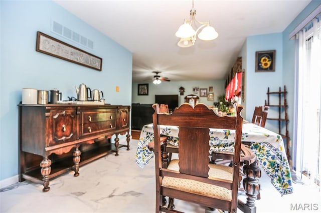 6144 Misty Meadow Dr, House Springs, MO 63051 - dining room with a chandelier and a ceiling fan