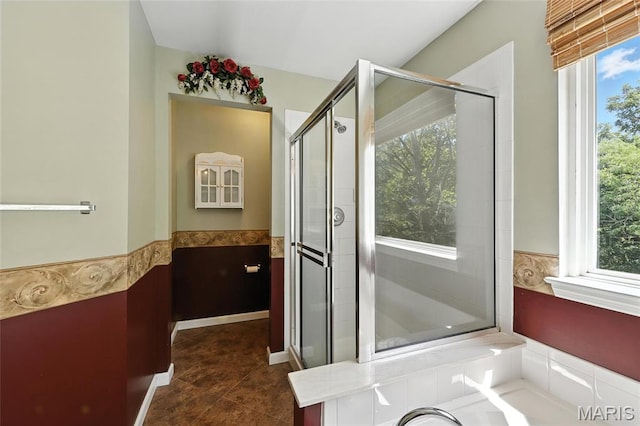6144 Misty Meadow Dr, House Springs, MO 63051 - bathroom with a stall shower, a bath, and wainscoting