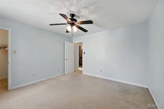 6144 Misty Meadow Dr, House Springs, MO 63051 - unfurnished bedroom with light carpet, a walk in closet, and ceiling fan