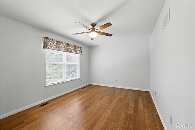 6144 Misty Meadow Dr, House Springs, MO 63051 - unfurnished room featuring a ceiling fan and wood finished floors