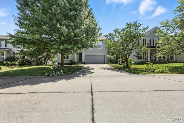 6144 Misty Meadow Dr, House Springs, MO 63051 - obstructed view of property with driveway, an attached garage, and a front lawn
