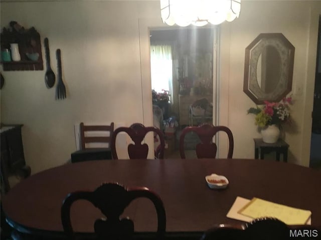 504 S Hickory St S, Cuba, MO 65453 - dining area featuring a chandelier