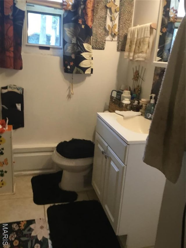 504 S Hickory St S, Cuba, MO 65453 - bathroom with vanity, toilet, and tile patterned floors