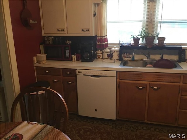 504 S Hickory St S, Cuba, MO 65453 - kitchen with dishwasher, light countertops, and a sink