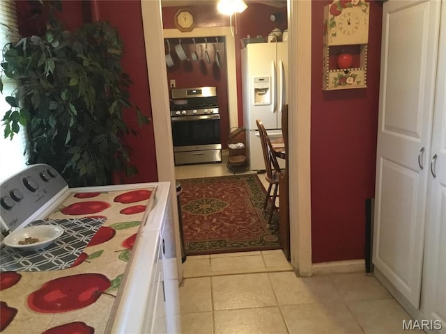 504 S Hickory St S, Cuba, MO 65453 - hall with light tile patterned floors and baseboards
