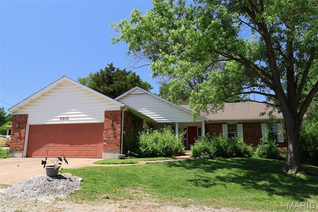 5501 Dober Ln, Saint Louis, MO 63129 - single story home featuring an attached garage, a front lawn, concrete driveway, and brick siding