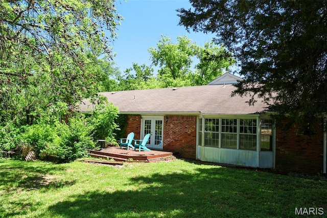 5501 Dober Ln, Saint Louis, MO 63129 - back of property featuring french doors, brick siding, a lawn, and a wooden deck