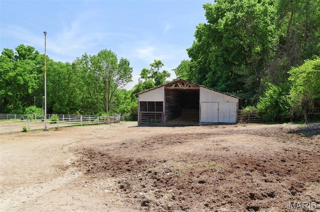 5501 Dober Ln, Saint Louis, MO 63129 - view of outbuilding featuring an exterior structure and a carport